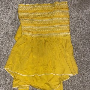Yellow flared tube top. Size small fits mediums. Never worn!